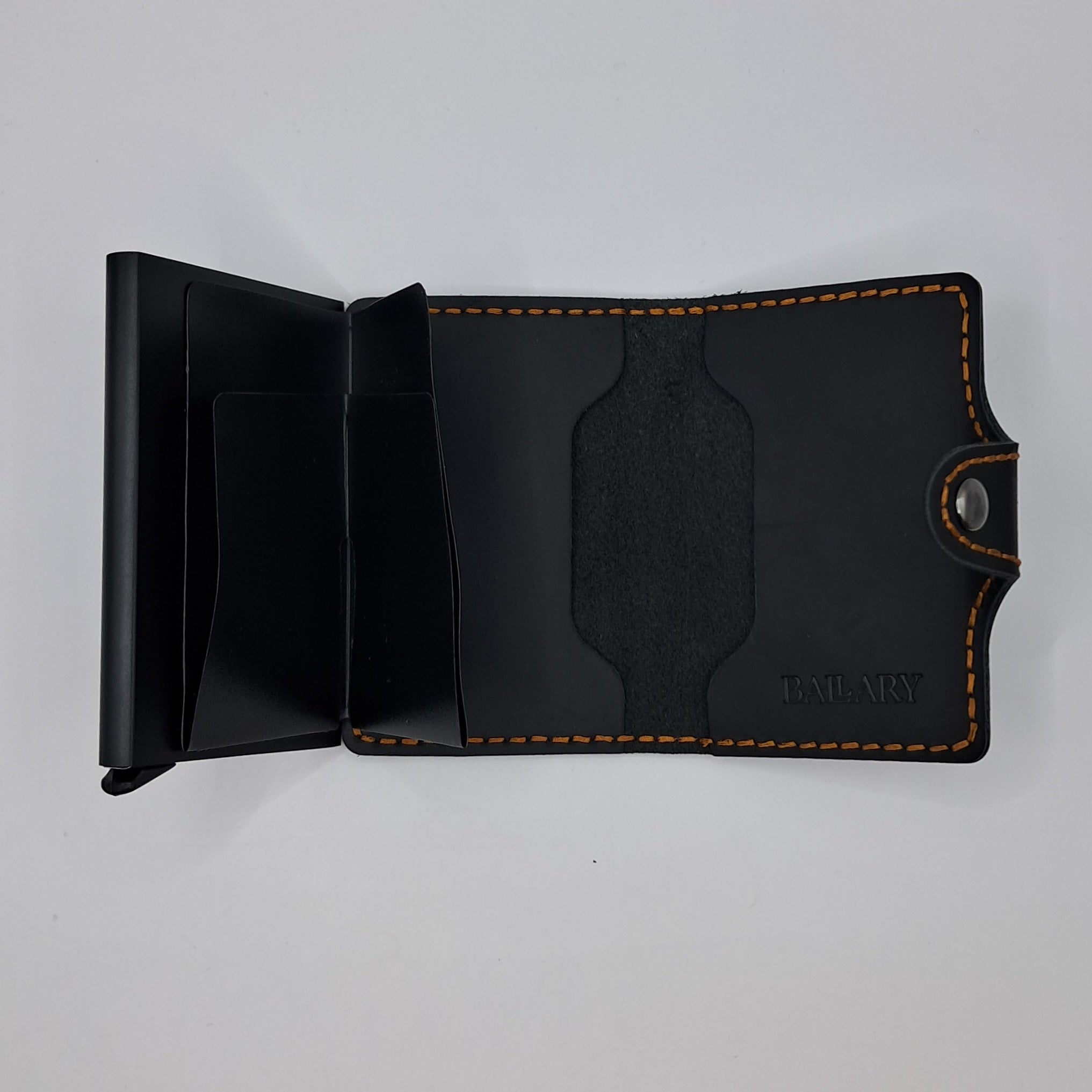 Billetera de cuero genuino, estilo tarjetero de doble hoja con broche.